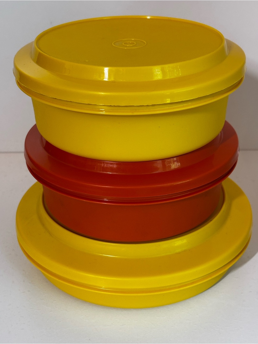 Tupperware set of three Seal ‘n Serve bowls and lids: orange & harvest gold
